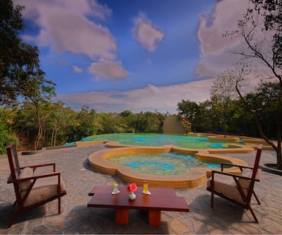 https://imgcld.yatra.com/ytimages/image/upload/t_hotel_yatra_city_desktop/v1438160095/Domestic Hotels/Hotels_Bandipur/The Windflower Resorts and Spa/POOL DINNING1.jpg